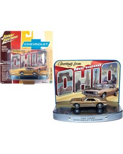 1967 Chevrolet Camaro Gold 1/64 Diecast Model Car with Collectible Tin Display